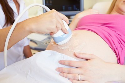 When are signs of a baby’s gender determined by ultrasound?